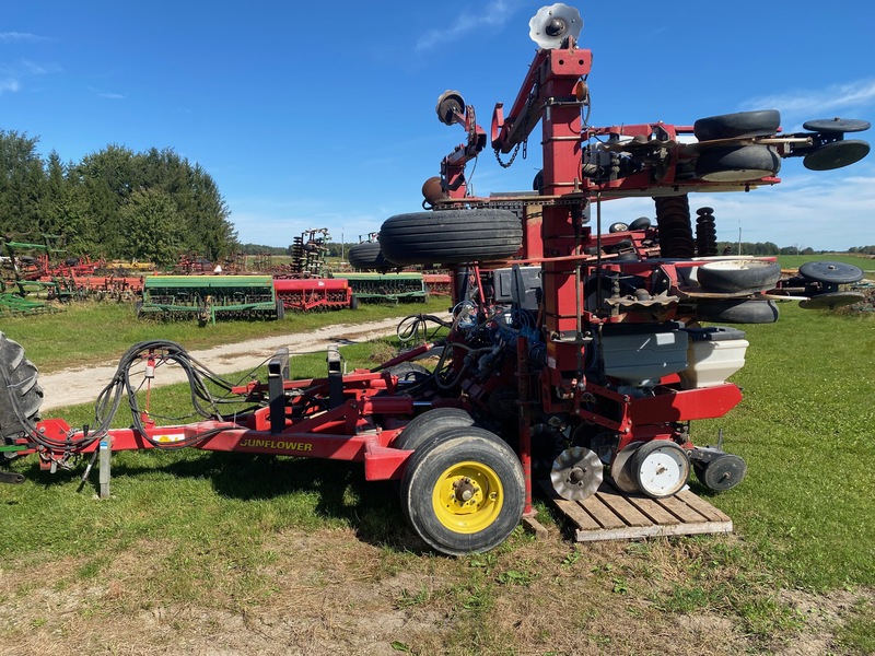 Planting  White 6700 8 Row Corn Planter w/ Sunflower Cart Photo